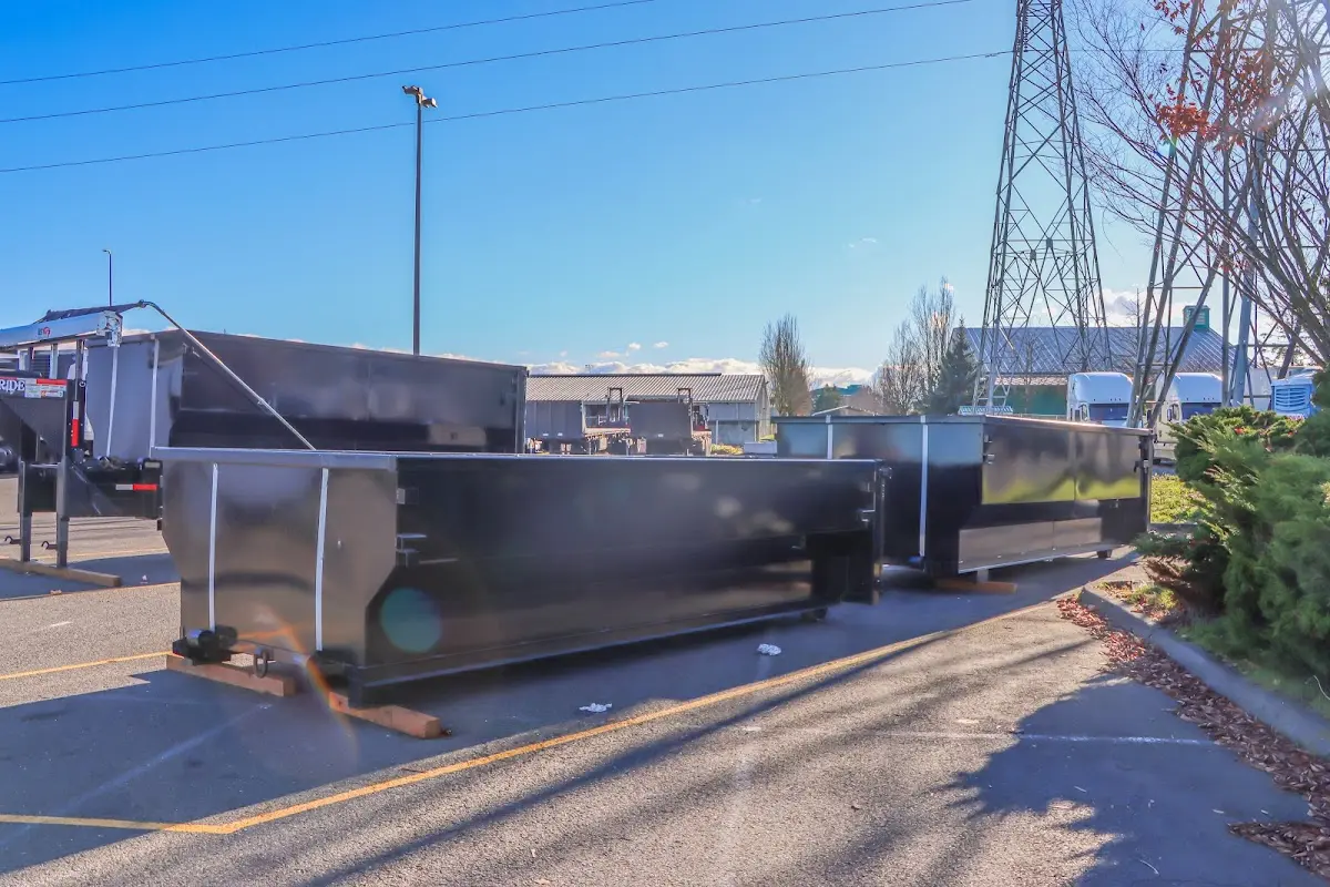 Roll-off dumpster ready for waste disposal at job site for 6 Yard Dumpster Rental in Belmont